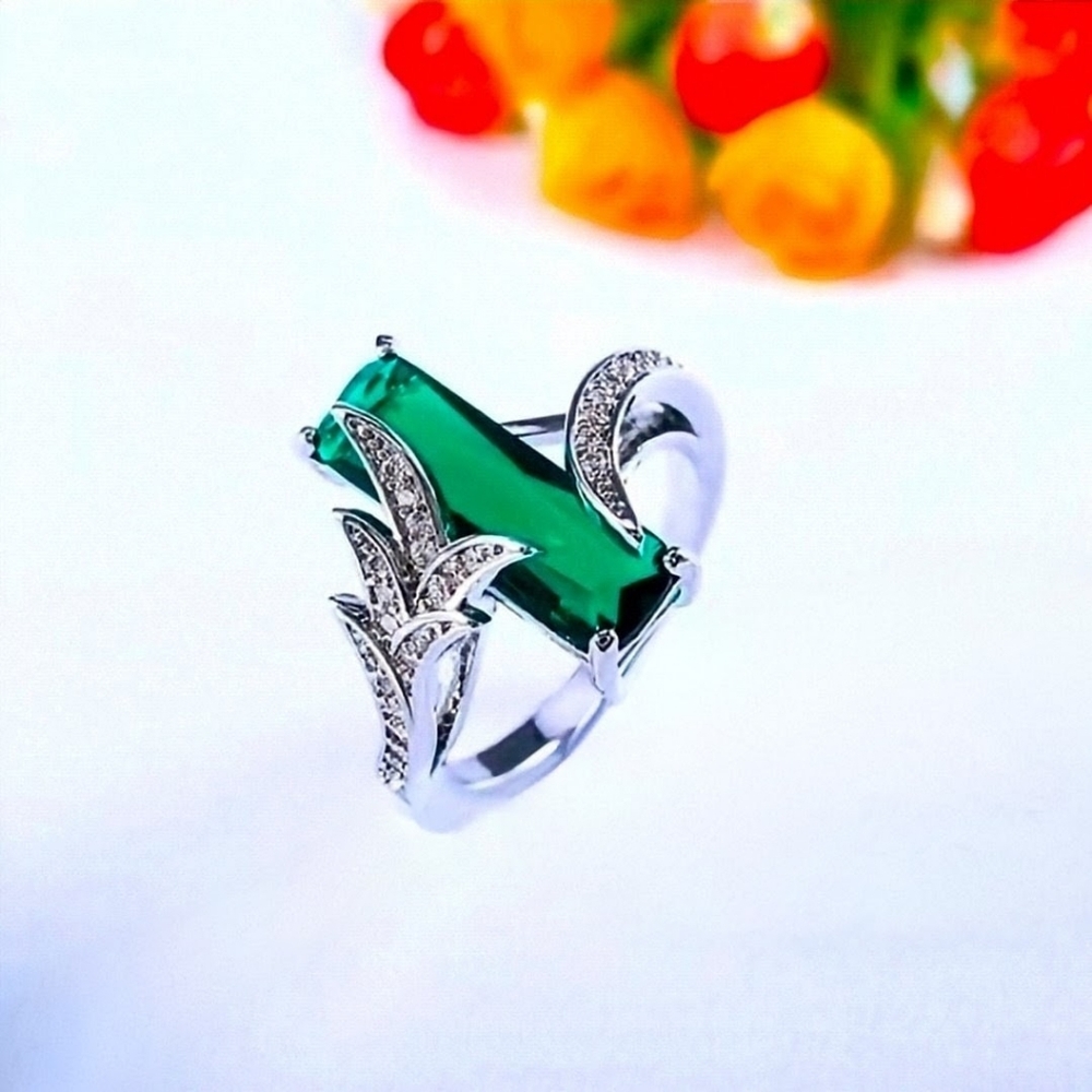 Elegant Silver and Emerald Green Gemstone Fashion Ring. CZ Accents. Size 9